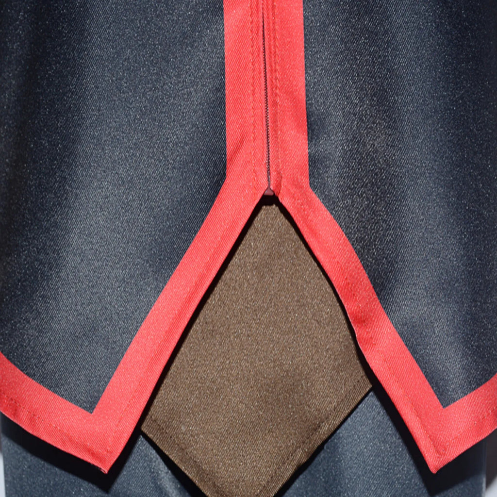 red trim and brown patch hem detail close-up of cosplay outfit