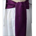 closeup of purple waist sash for monkey d luffy gear 5 cosplay, tied bow at waist, white elastic shorts